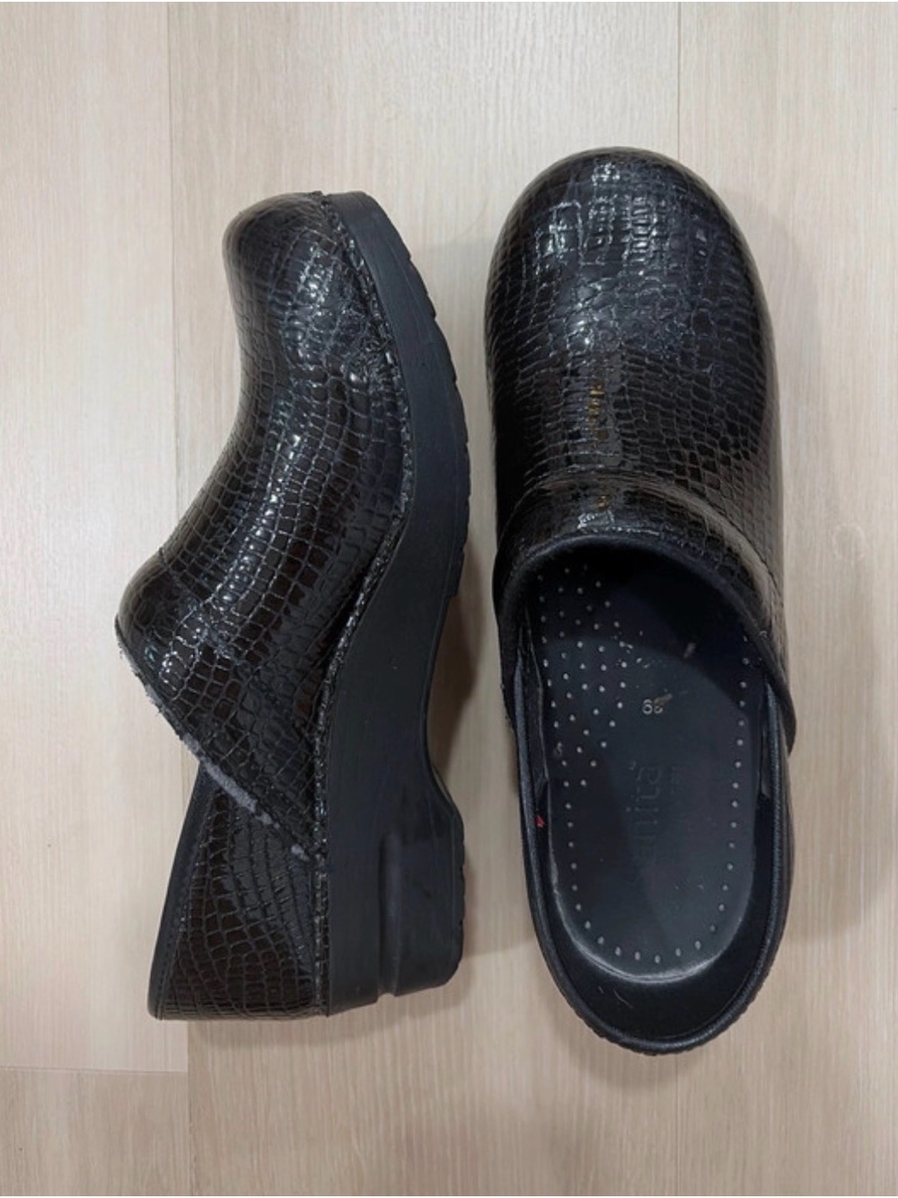 Sanita Black Croc-Texture Slip-Ons